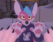 fox keeri posing with pawbs